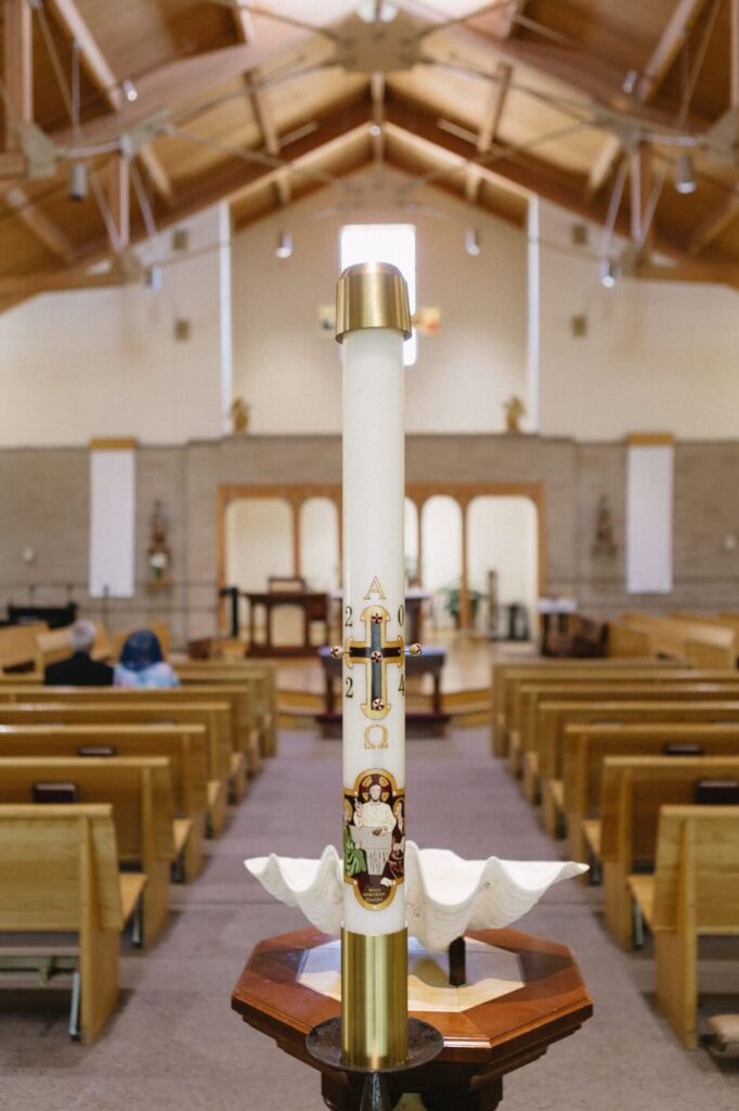 candle at catholic church before wedding ceremony